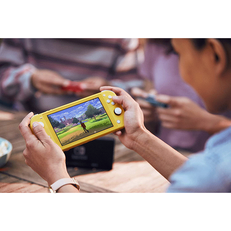 Nintendo Switch Console Lite Yellow holding - GameXtremePH